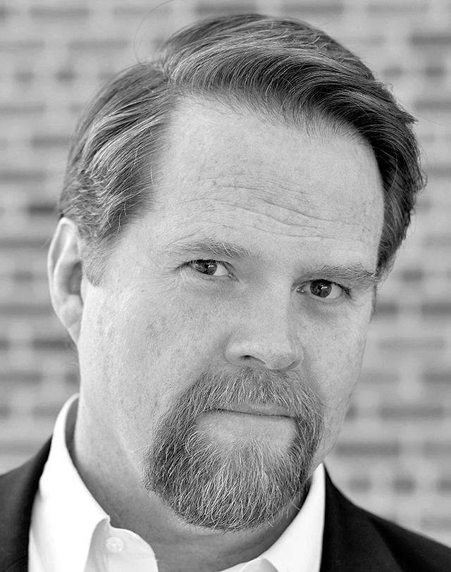 Headshot of John Treacy Egan, Broadway performer