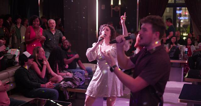 Guests clinking glasses and celebrating together with Broadway Stars